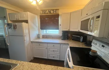 white shaker cabinets and updated kitchen