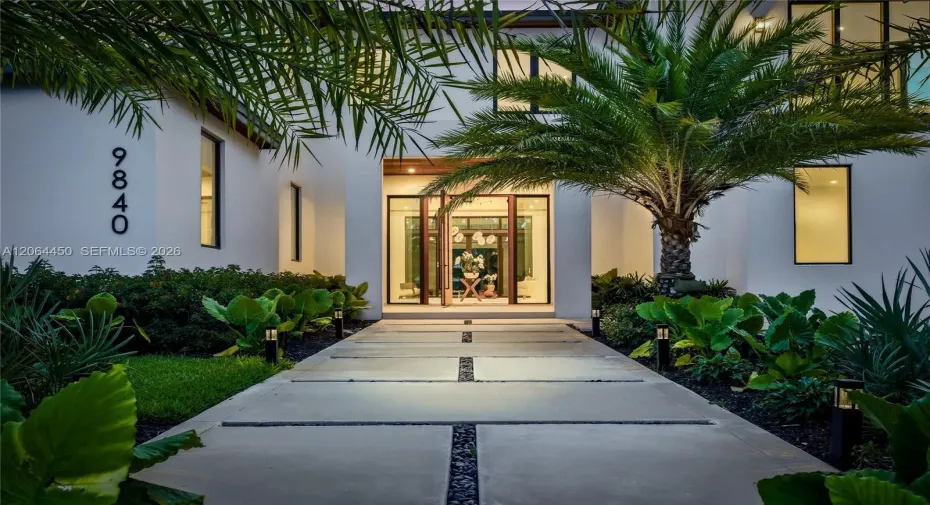 Front Entrance with Elegant Oversized Teak Wood Door