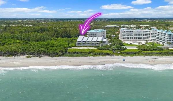 Aerial oceanfront with arrow