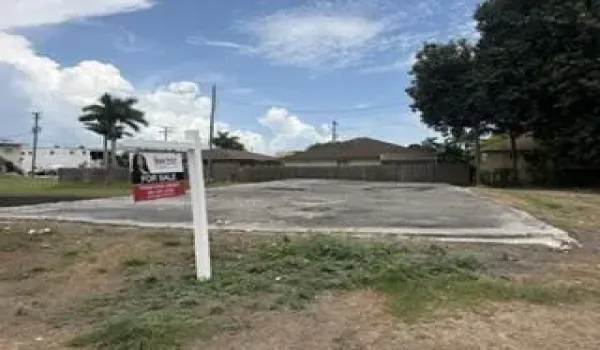 front of vacant land 4th St