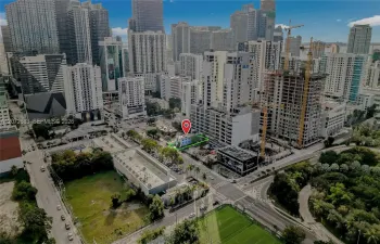 PRIME BRICKELL REDEVELOPMENT OPPORTUNITY featuring a highly visible corner-positioned parcel along SW 8th Street, surrounded by major new development and Miami’s rapidly evolving urban core. Exceptional exposure, strong traffic visibility, and a strategic location just moments from Brickell City Centre, Downtown Miami, and major transit connections make this an outstanding site for a future high-density development. The aerial view highlights the parcel’s valuable footprint within one of Miami’s most dynami