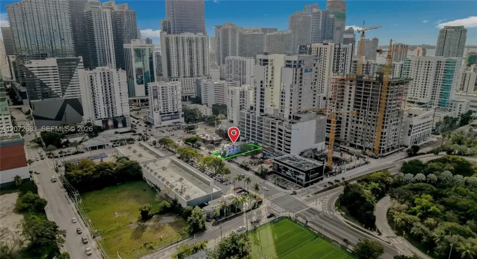 PRIME BRICKELL REDEVELOPMENT OPPORTUNITY featuring a highly visible corner-positioned parcel along SW 8th Street, surrounded by major new development and Miami’s rapidly evolving urban core. Exceptional exposure, strong traffic visibility, and a strategic location just moments from Brickell City Centre, Downtown Miami, and major transit connections make this an outstanding site for a future high-density development. The aerial view highlights the parcel’s valuable footprint within one of Miami’s most dynami