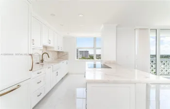 Open concept kitchen with granite countertops