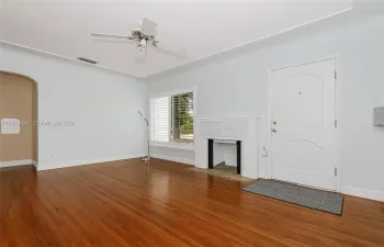 Beautiful wood floors greet you as you enter the living room.
