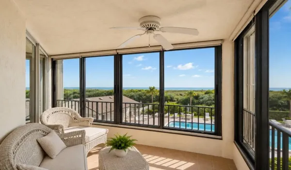 Enjoy the ocean and pool view from your porch