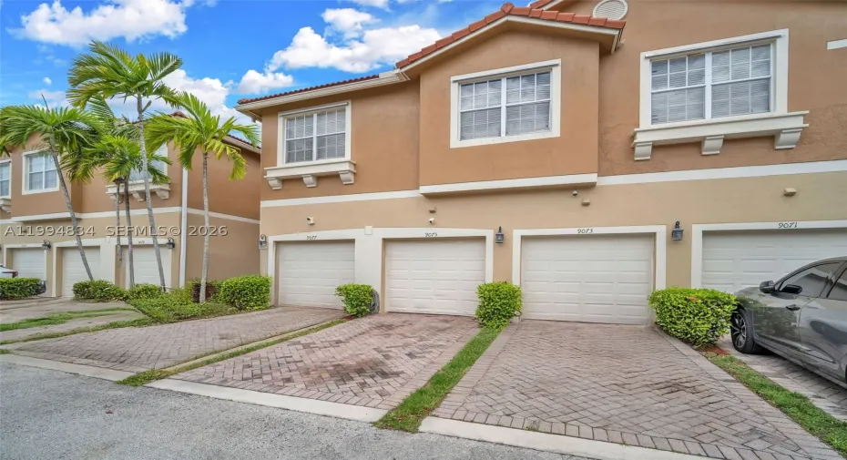 1 car garage and parking  with driveway.