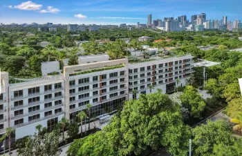 2200 Brickell surrounded by South Brickell's lush canopy
