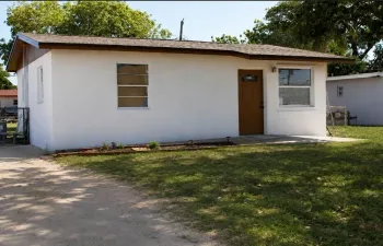 Affordable Fort Lauderdale single-family home with no HOA, new roof, hurricane protection, large fenced yard and ample off-street parking.