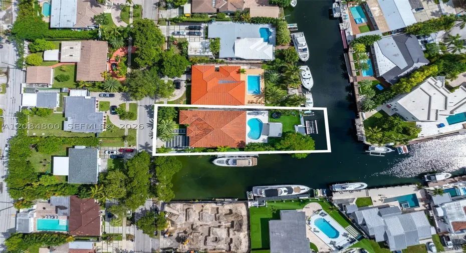 272 feet of double waterfront on a 12,300 SF corner lot