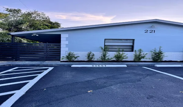Paved parking area with white line markings and 