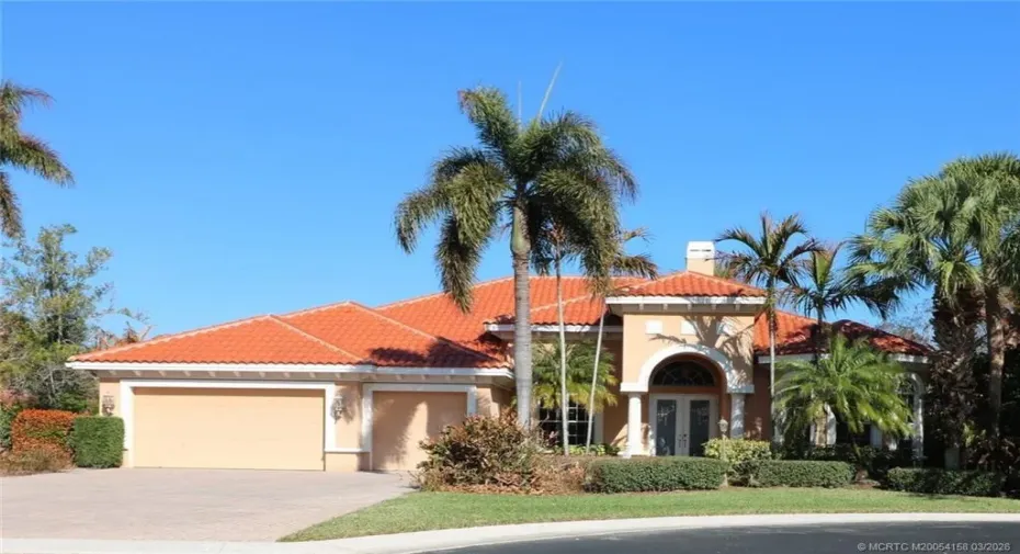 Beautiful entrance with 3 car garage and plenty of addtl parking space