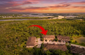 Dusk aerial with arrow on unit