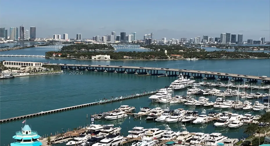 View from Master Bedroom of Miami Beach Marina and Fisher Island.