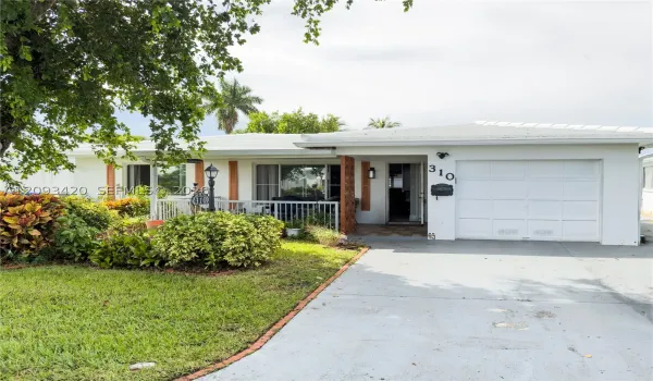 310 NW 25th Ct
