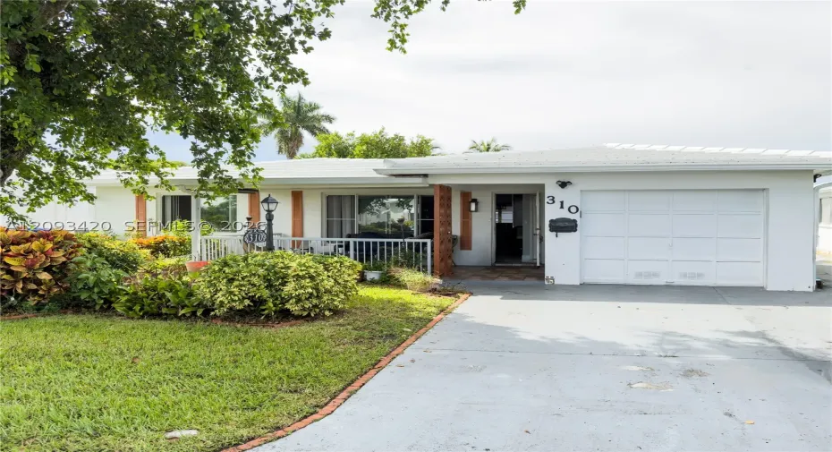 310 NW 25th Ct