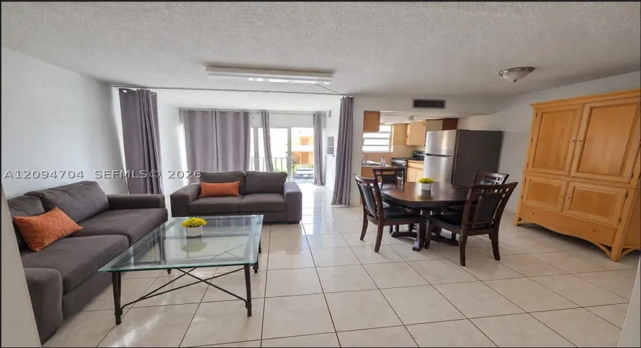entry level has 1/2 bath and bonus space by the windows,  enclosable for office or bed