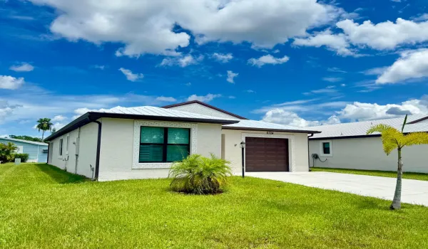 Extended driveway - Metal Roof