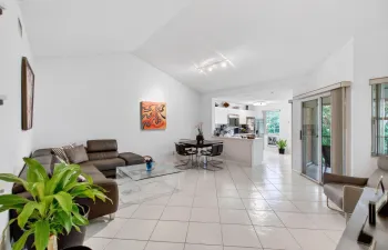 LIVING ROOM WITH VAULTED CEILINGS
