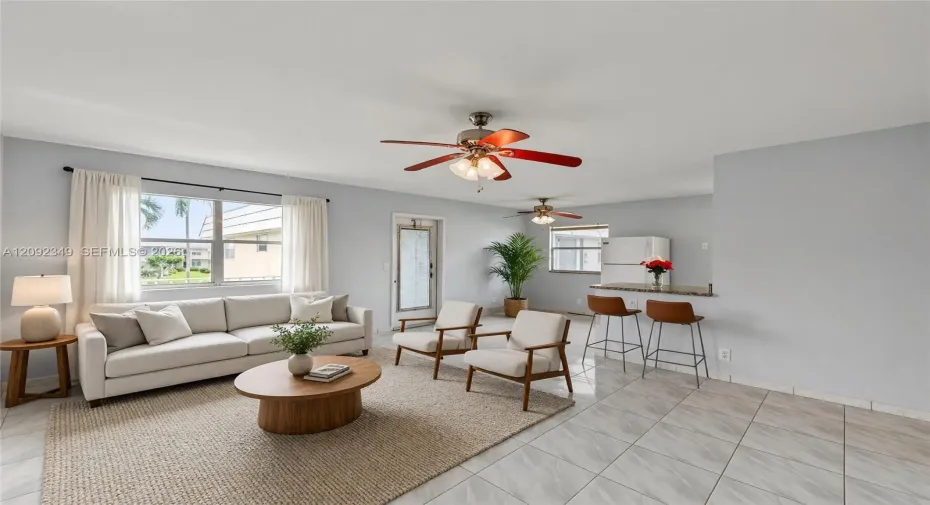 Virtual Staging: Quaint living room/dining room with ample space for full furniture amenities
