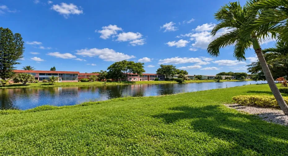 Gorgeous WATER VIEWS and Fabulous Location! First Floor CORNER 2/1.5 In The Prime Dorchester Section of 55+ Century Village