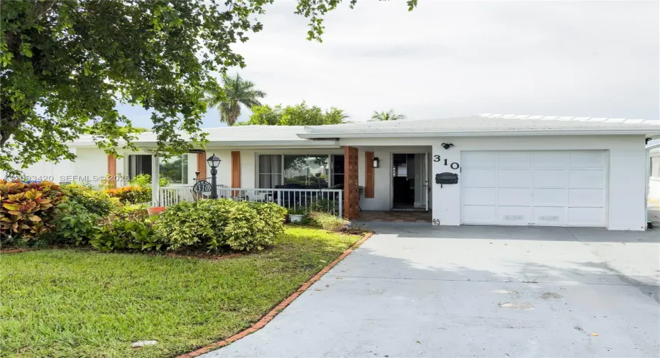 310 NW 25th Ct