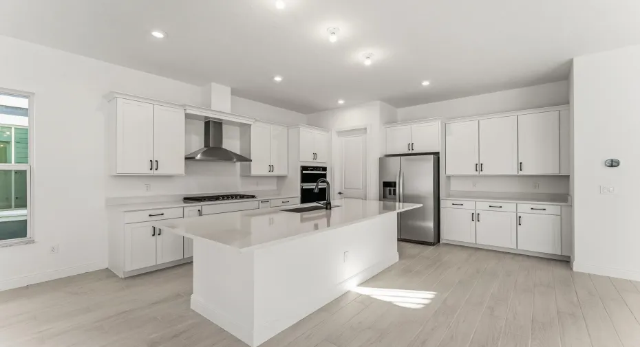 Stock photos represent builder's floorplan