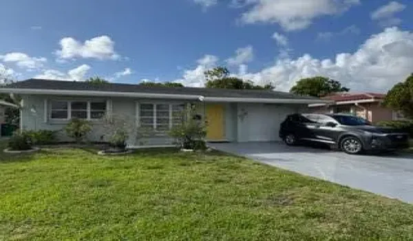 Beautiful Single-story residence featuring oversize concrete driveway parking for 4