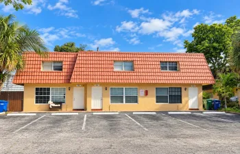 Sunny Tropical Townhouse Parking Lot
