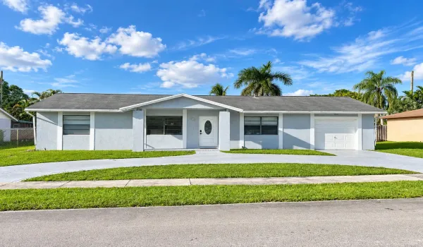 Exterior of home. Circular driveway
