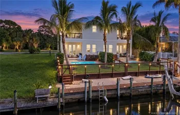 Canal, Dock, and Back Yard Views
