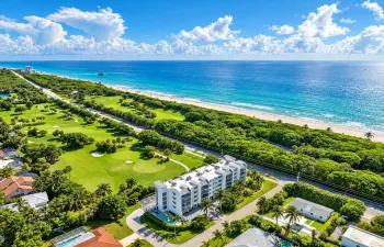Sunlit Aerial Coastal Resortscape