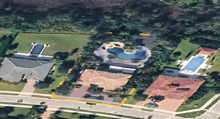 .54 acres, 7 Bedrooms, 6.5 Baths and gorgeous lagaon style pool