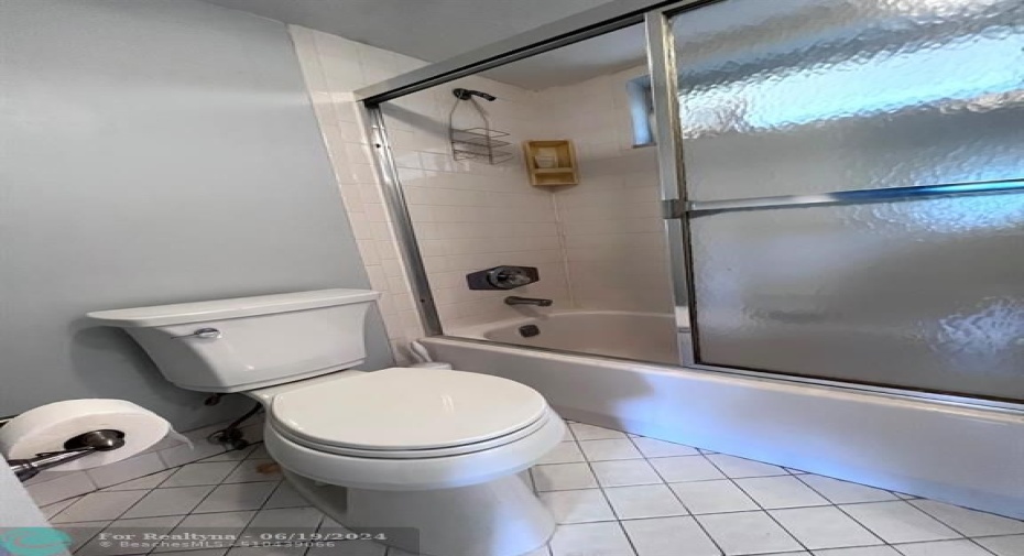 Separate Water closet - with combined tub/shower  Glass sliding doors