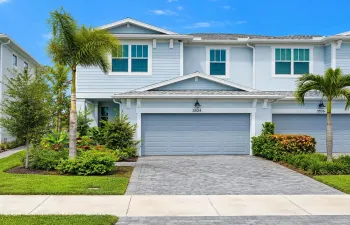 Coastal Blue Townhouse with Tropical Lan