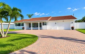 0Sunny Palm-Framed Suburban Home