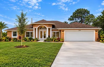 Warm Terracotta Home with Lush Landscapi