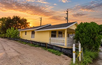Golden-Hour Yellow Cottage Inspection