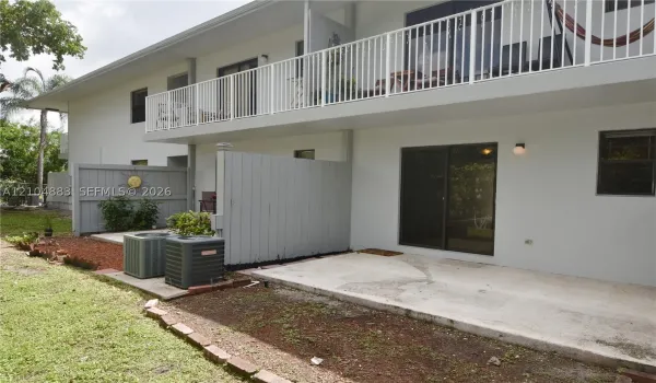 Upper-level balcony with white railing