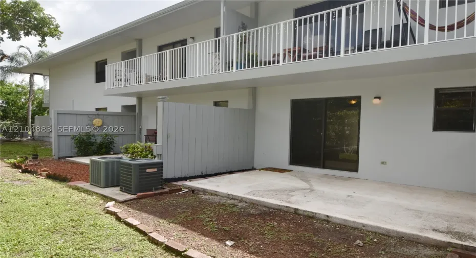 Upper-level balcony with white railing