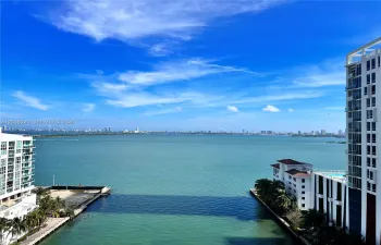 Expansive water frontage with cityscape backdrop