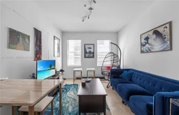Welcome home to your living room filled with natural light