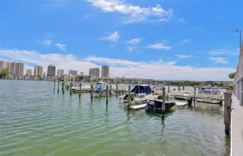 Waterfront bulkhead featuring multiple deep-water boat slips with individual pilings