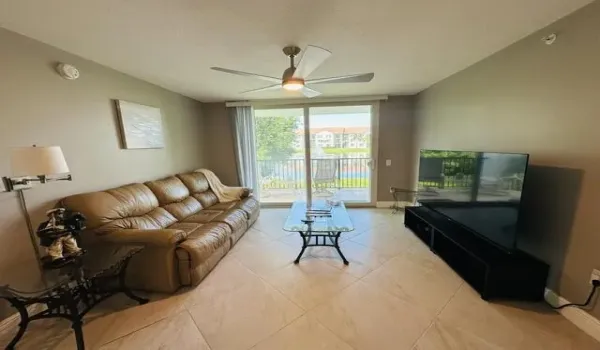 Updated Condo with large tile throughout the entire unit. Impact Windows & Sliding Doors-Corner Unit - covered Waterview patio- Kitchen has Waterview as well.Rent includes water sewer trash basic cable and basic Wi-fi through dish network.Guest bathroom totally remodeled with shower