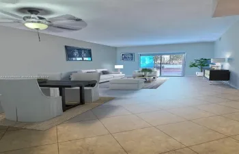 Open-concept living space featuring large-format tile flooring, a mounted ceiling fan with integrated lighting, and a floor-to-ceiling glass sliding door