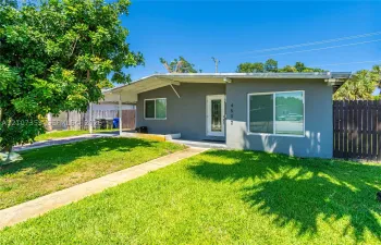 Welcoming front exterior of this cozzy East Pompano Beach single-family home.