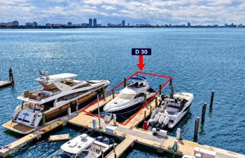 Deeded boat slip D 30 featuring fixed wooden pilings and direct waterway access