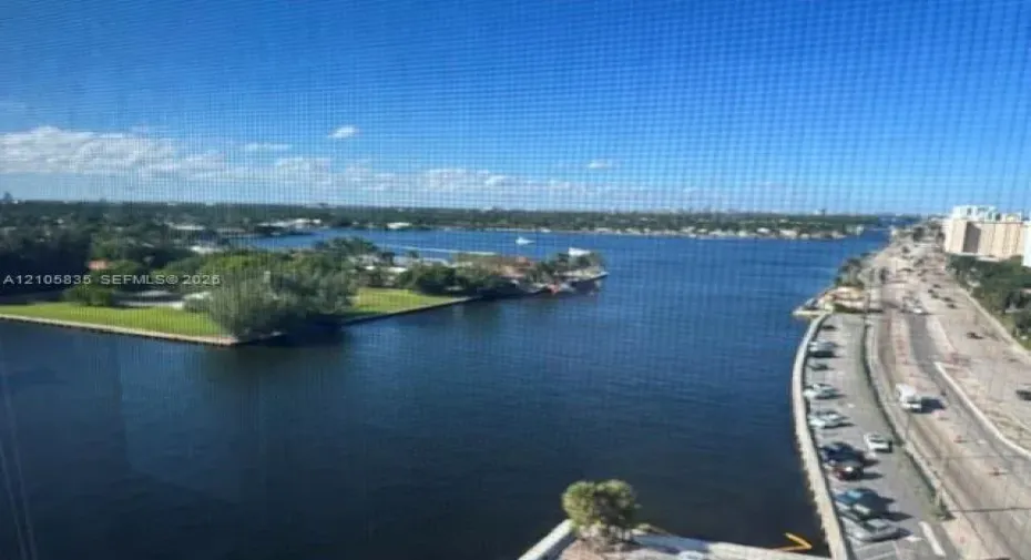 Panoramic waterway exposure with expansive waterfront frontage, including shoreline landscaping and maritime access