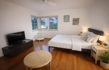 Wood-finish flooring, multi-pane windows, and ceiling fan