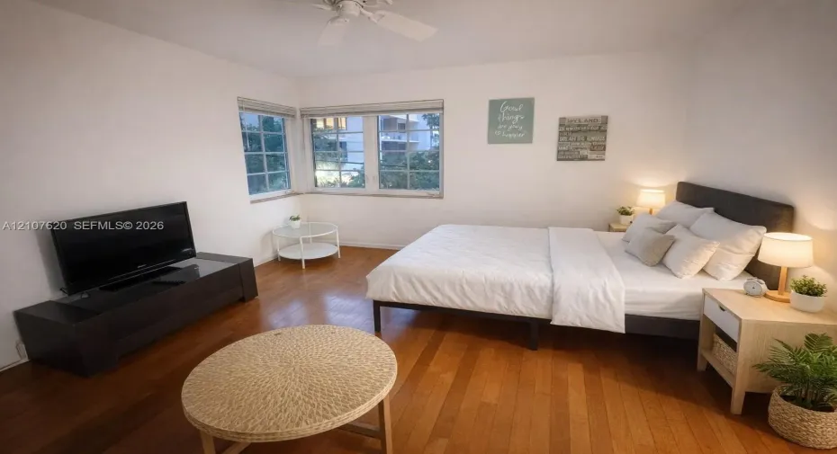 Wood-finish flooring, multi-pane windows, and ceiling fan