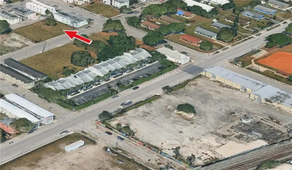 Corner lot parcel featuring street-level accessibility, urban positioning, and cleared land